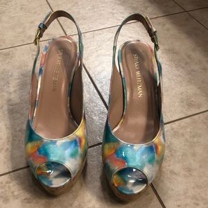 Seldom worn floral patent wedges